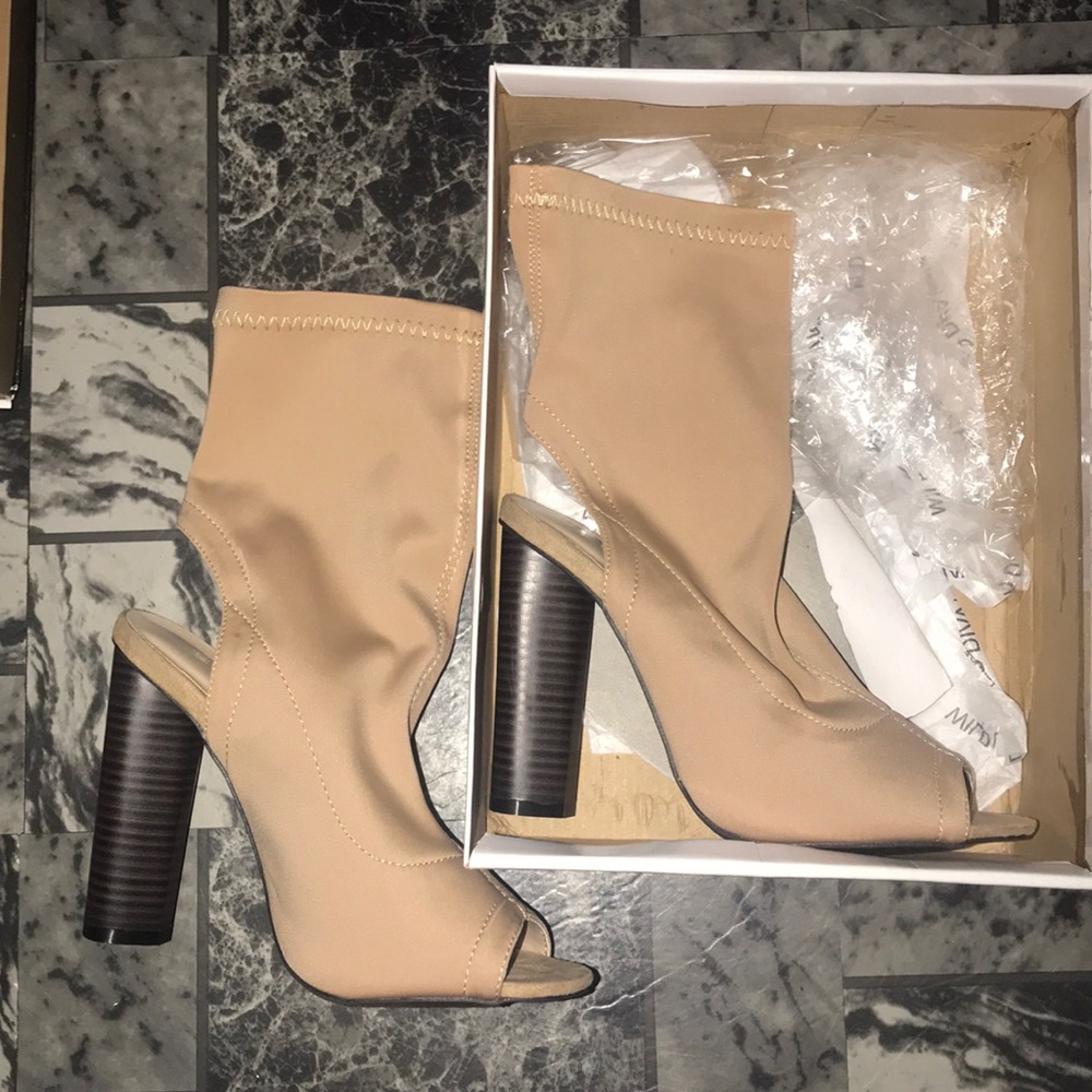 Nude peep toe shoes